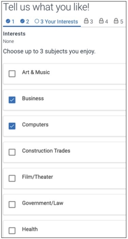 Screenshot of Tell us what you like screen. Choose up to three subjects that you enjoy from a preset list. Then select the Next button to proceed.